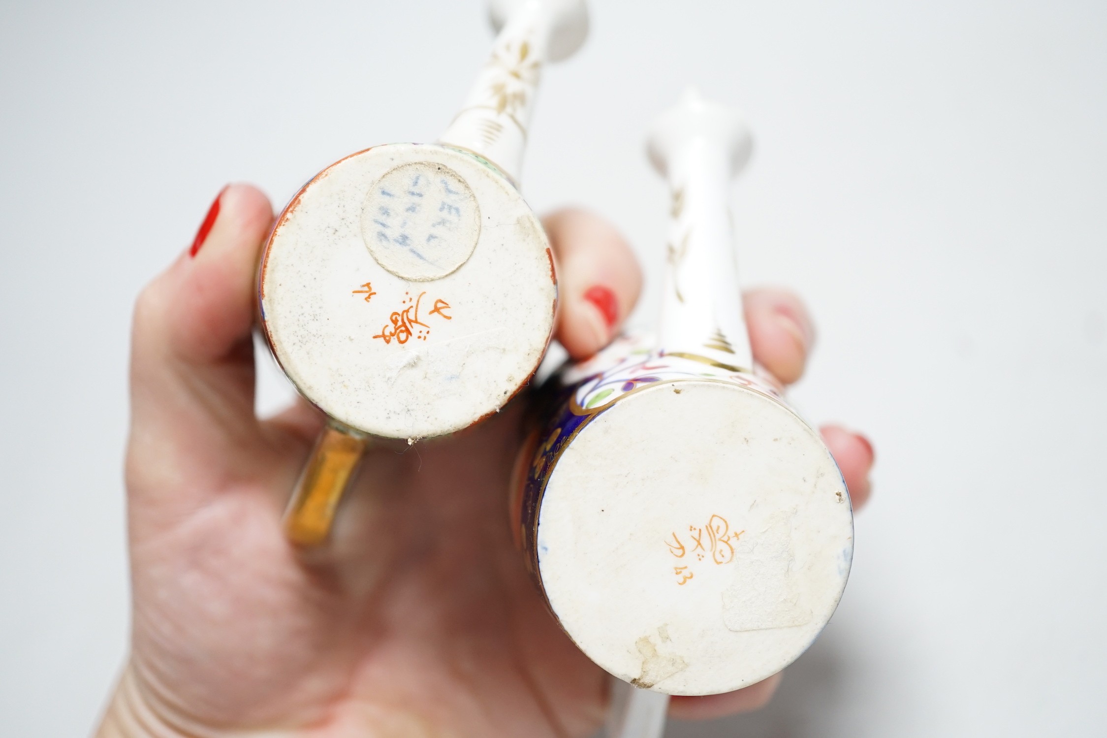 Toy porcelain: Two Derby Japan pattern rosewater sprinklers, c.1815, each modelled in the form of a watering can. 7cm tall